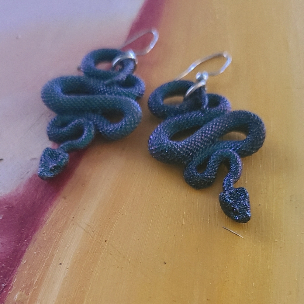 Unique herpetologist snake charmer earrings